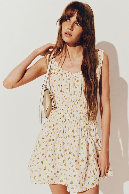 Smocked dress - cream oranges