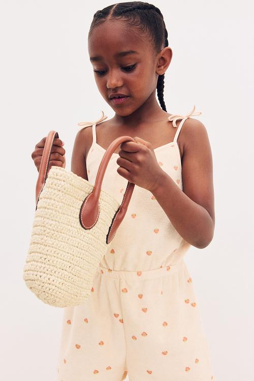 Patterned terry jumpsuit - light apricot/strawberries