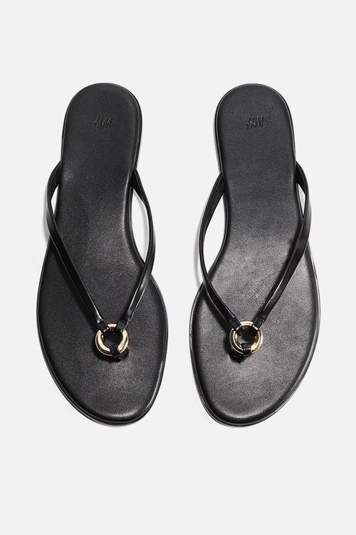Ring-detail flip-flops - black