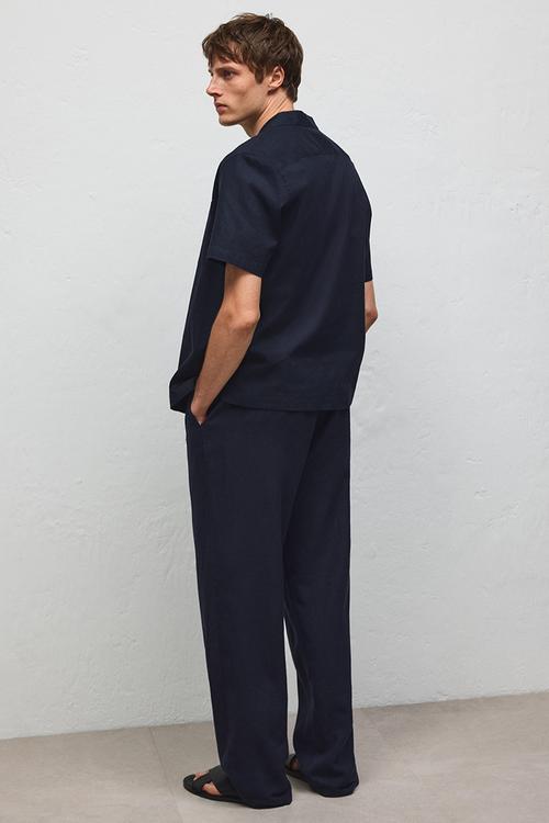 Relaxed fit linen-blend trousers - navy blue