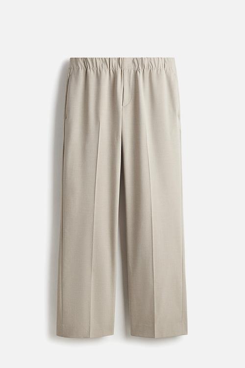 Relaxed fit trousers - beige
