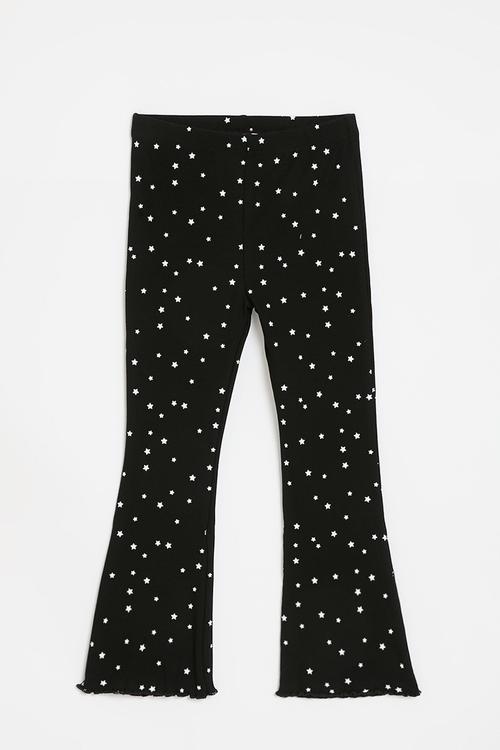 Flared leggings - black stars