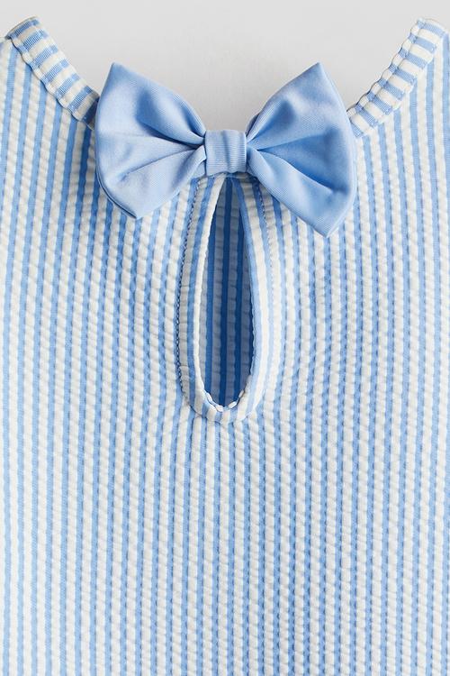 Long-sleeved swimsuit - light blue/striped