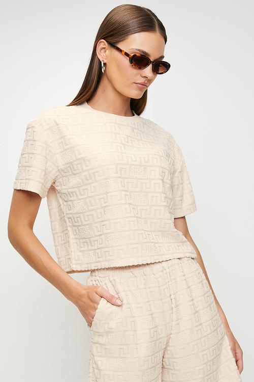Ladies ayaan embossed logo top - stone