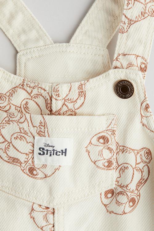 Printed dungaree dress -  cream/lilo & stitch 
