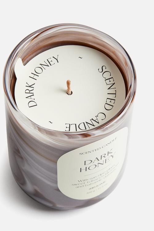 Scented candle in glass holder - dark honey