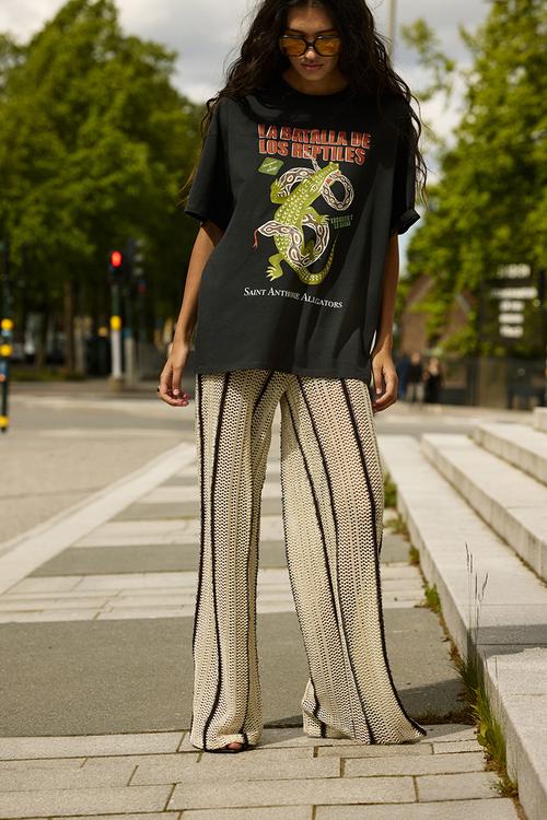 Shimmering hole-knit trousers - beige striped