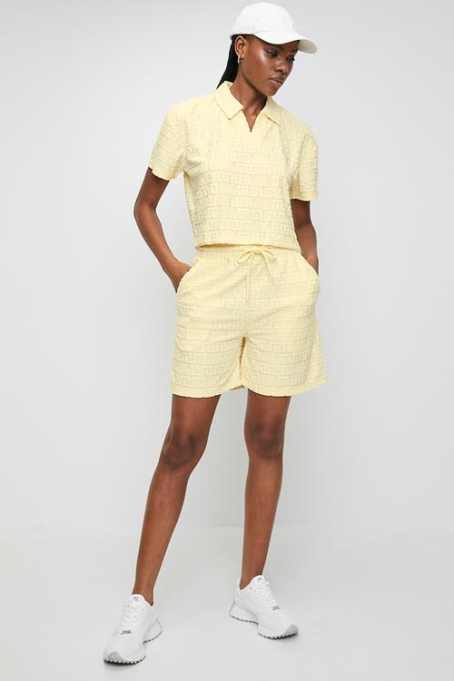 Ladies tessa embossed logo top with collar - lemon