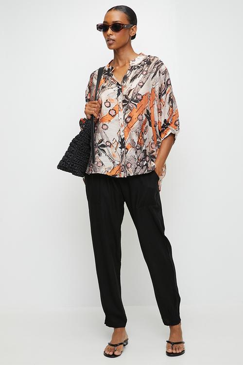 Half Sleeve Easy Wearing Batwing Blouse With Centre Back Button Detail - Multi Orange