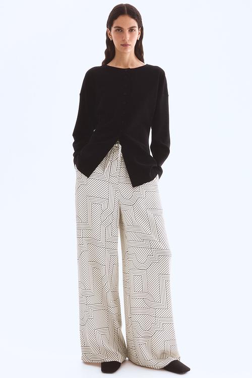 Wide trousers - cream patterned 