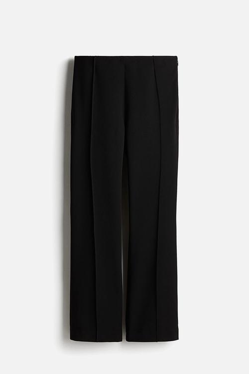 Flared crease-leg trousers - black