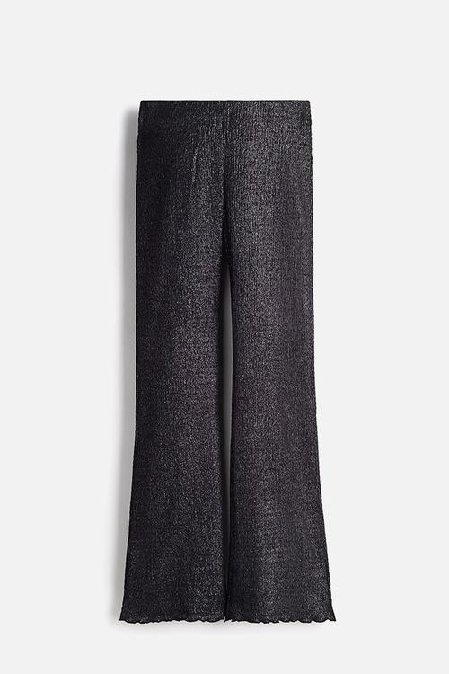 Smocked flared trousers - black glittery