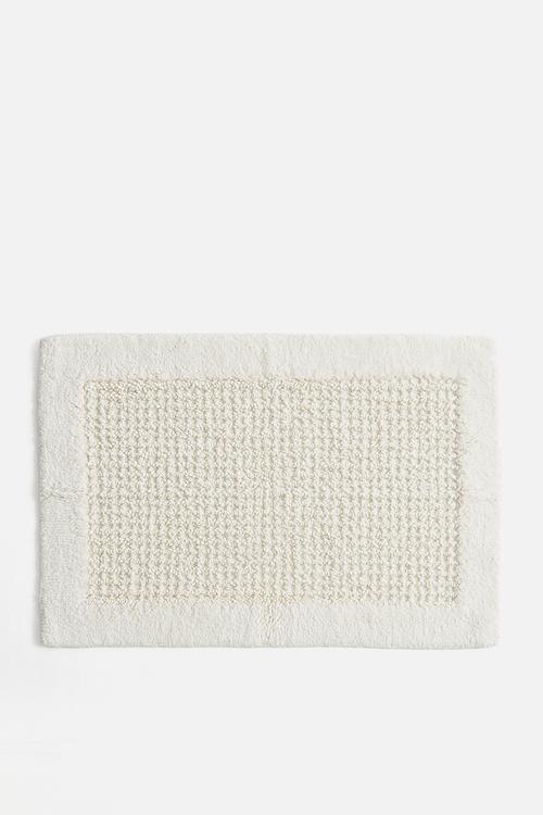 Tufted cotton bath mat - white
