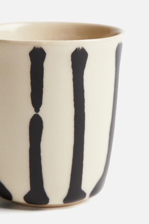 Drip-glazed stoneware mug - light beige/patterned