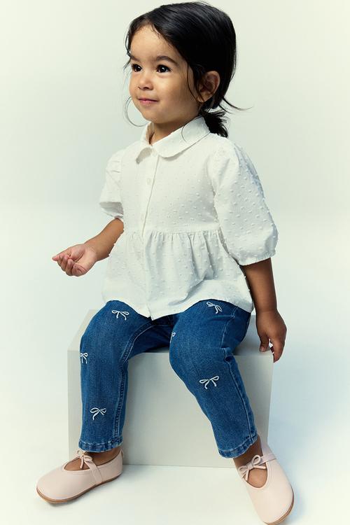 Embroidery-detail jeans - denim blue/bows