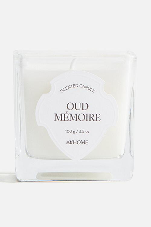 Small scented candle in glass holder - oud mémoire
