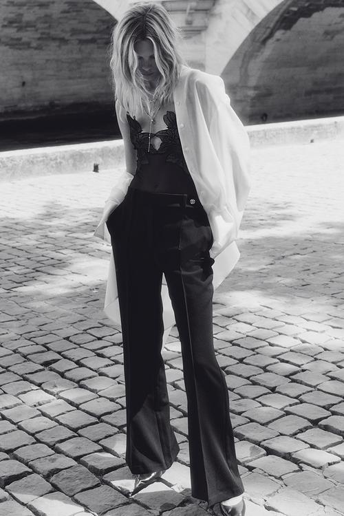 Flared crease-detail trousers - black