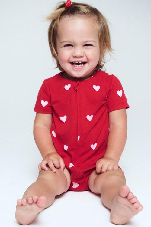 The Short Sleeve Zip Romper -  Varsity Red/Love Hearts