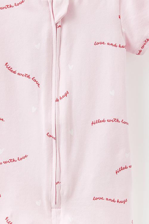 The Short Sleeve Zip Romper -  Tea Party Pink/Love & Hugs