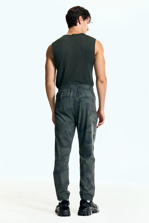 Regular fit sports joggers with drymove™ - dark green patterned