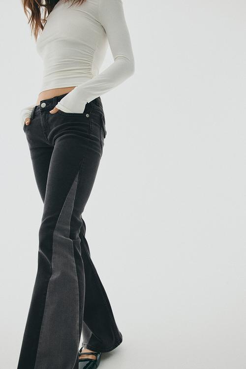 Flared low jeans - black/colour block