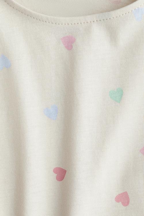 Printed flutter-sleeved top - cream/hearts