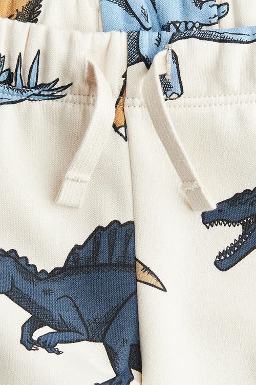 Printed joggers - white dinosaurs