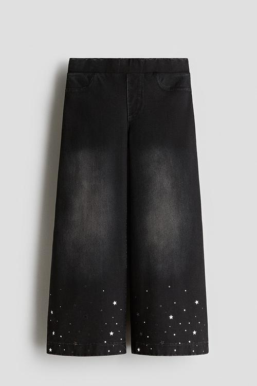Wide denim-look trousers - black stars