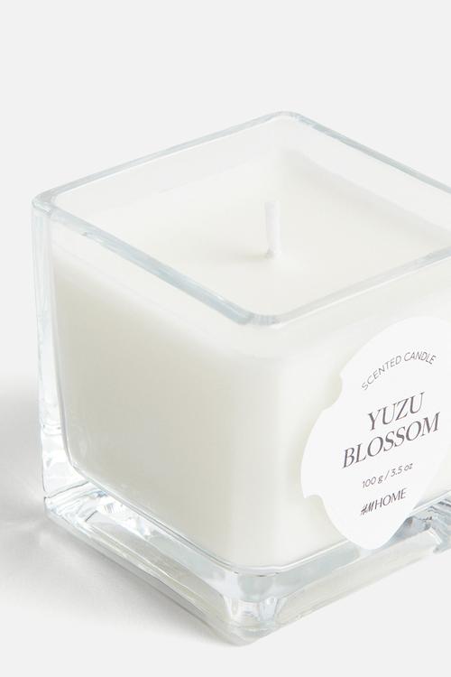 Small scented candle in glass holder - transparent