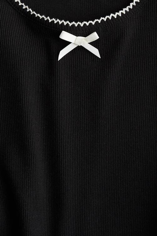 Picot-trimmed jersey top - black