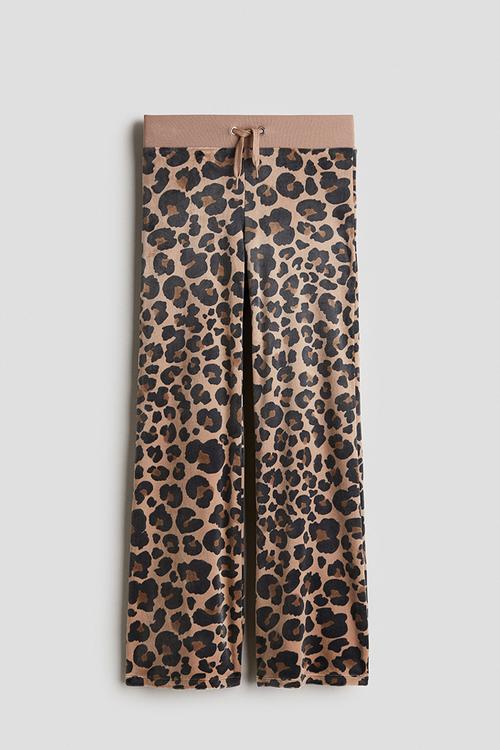 Flared velour joggers - beige/leopard print