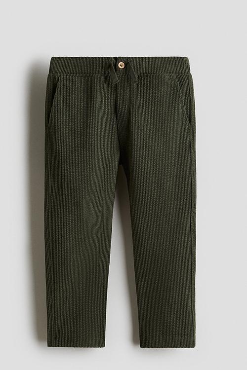 Ribbed velour trousers - dark green