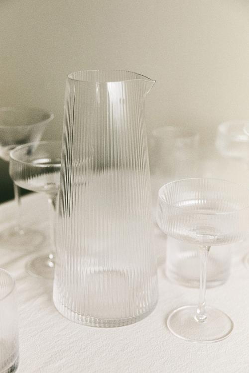 Fluted glass carafe - transparent