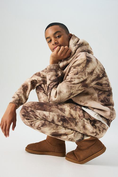 Printed sweatshirt joggers - light beige/tie-dye