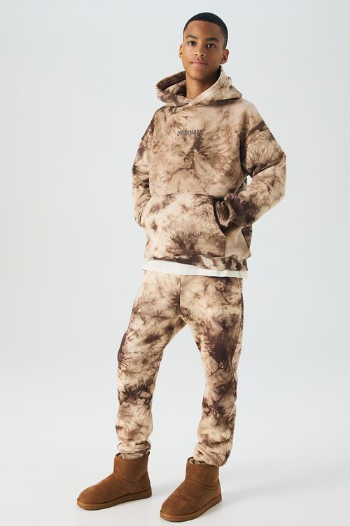 Printed sweatshirt joggers - light beige/tie-dye