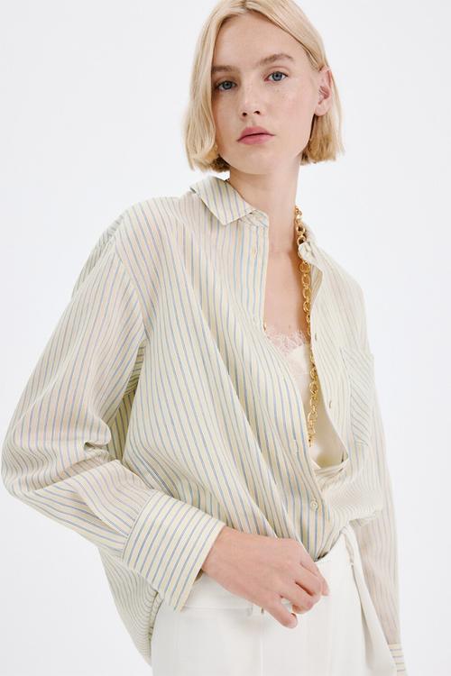 Shirt poke - light/pastel yellow