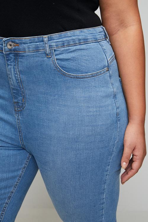 Plus butt shaper stretch fray hem denim flares - acid wash light blue