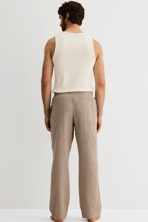 Relaxed fit flannel trousers - beige/checked