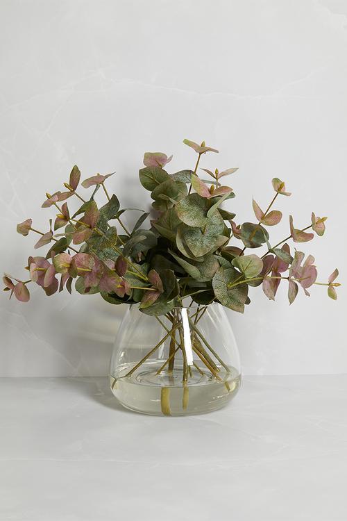 Eucalyptus leaves in small jar vase