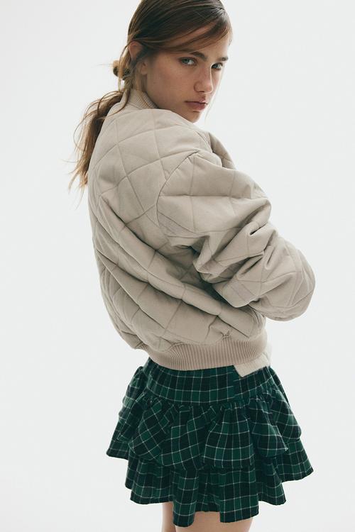 Quilted bomber jacket - beige