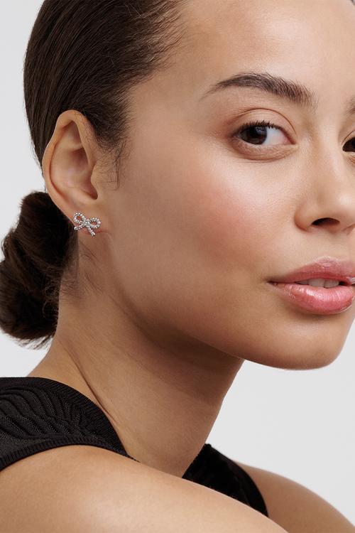 Ribecca crystal ribbon bow stud earrings - silver