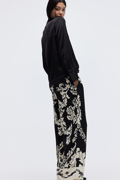 Wide trousers - black/patterned