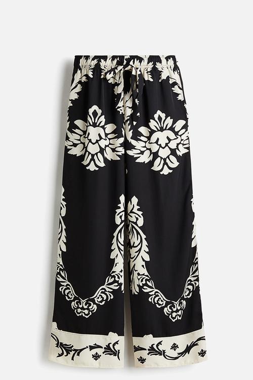 Wide trousers - black/patterned