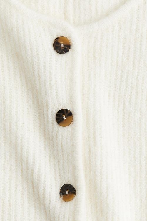 Rib-knit peplum cardigan - cream