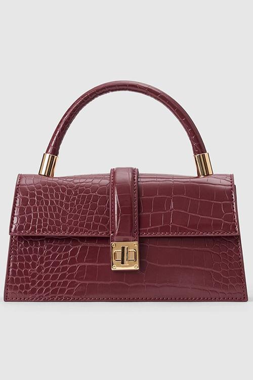 Violet lock detail top handle bag in vintage merlot