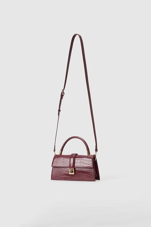 Violet lock detail top handle bag in vintage merlot