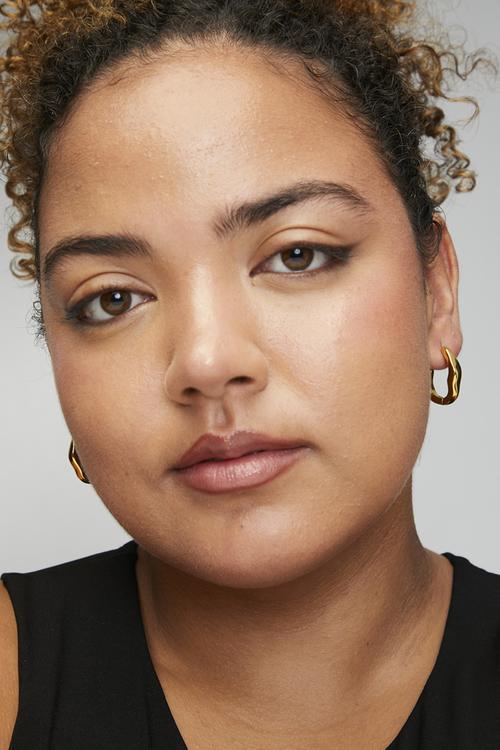 Modern twisted hoop earrings - gold