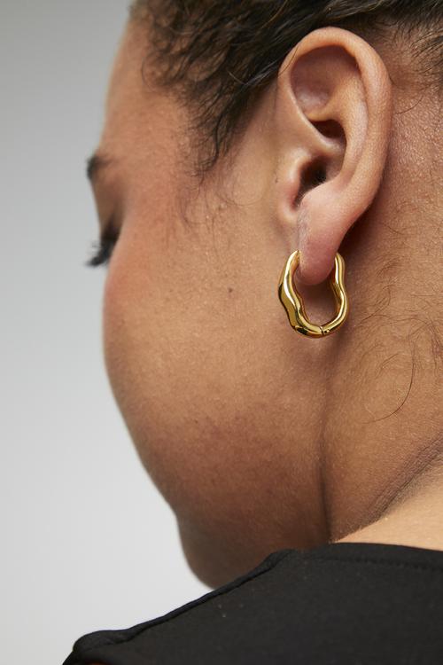 Modern twisted hoop earrings - gold