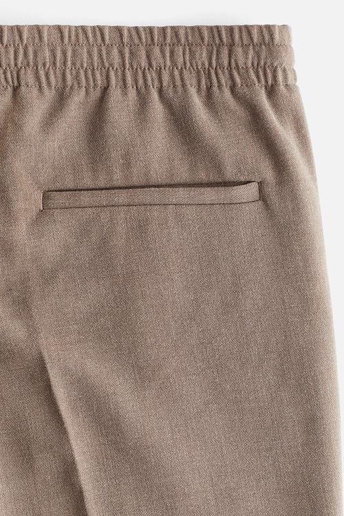 Relaxed fit trousers - beige marl