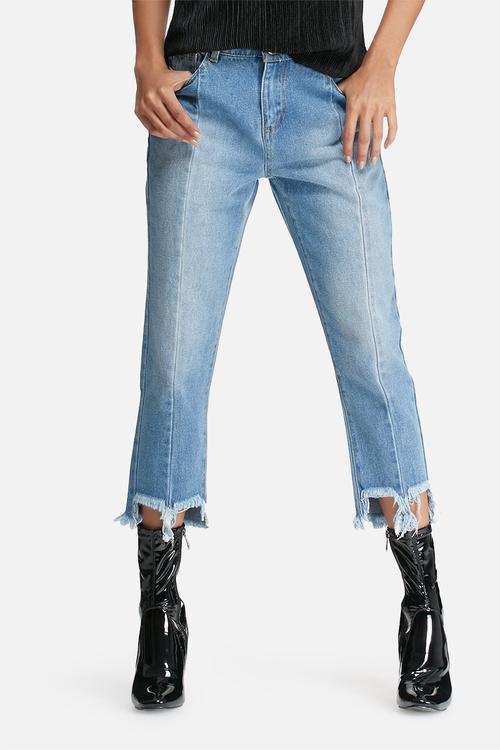 Reconstructed jeans with frayed hems